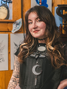 A photo of tattoo artist Carly Noëlle.
